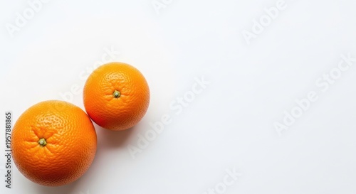 Fresh ripe oranges with textured peel on white background.