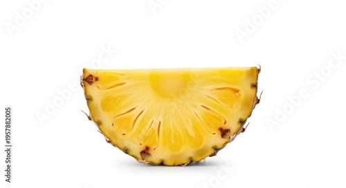 Fresh juicy pineapple slice cut in half revealing vibrant yellow interior on white background.