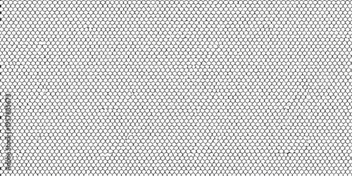 Honeycomb patterned texture fills the entire frame in black and white