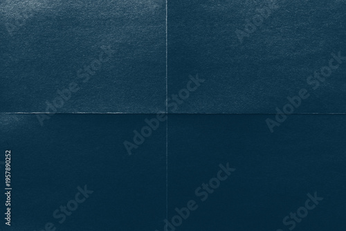 Textured dark blue paper background
