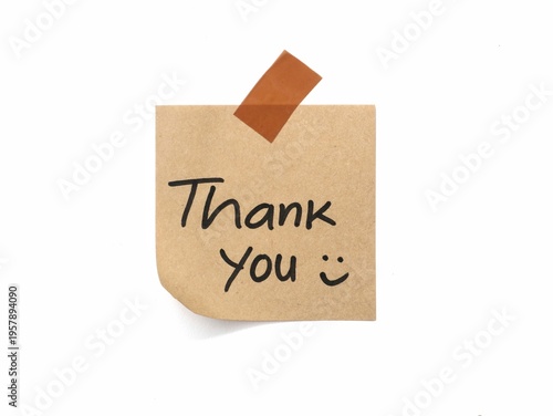 Brown adhesive note with handwritten thank you text isolated on white background. Perfect for concepts of gratitude, customer appreciation, and positive feedback