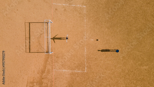 Top view of open football field in forest region with natural surroundings