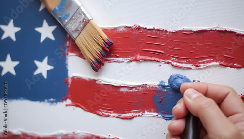 Painting American flag with blue brush on textured canvas background  