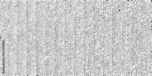 Close up of a heavily textured grainy and monochromatic surface