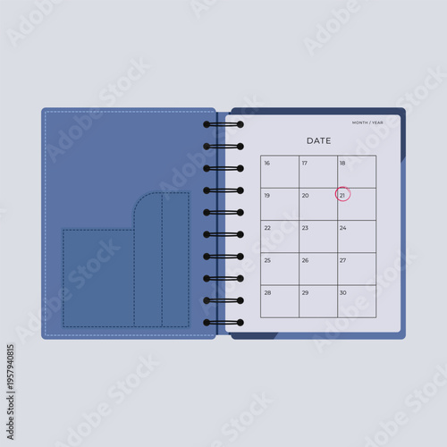 Spiral notebook with a calender and red mark rests on an office desk as a creative concept for business planning