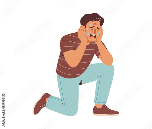 A stressed man kneeling down and talking on the phone in a frustrated manner.