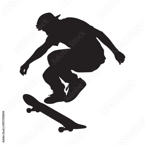 Silhouette of a skateboarder performing a trick