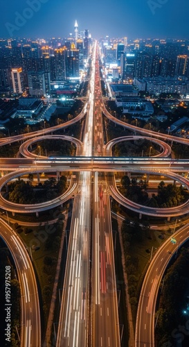 Vibrant Cityscape Highway Interchange Illuminated By Nighttime Lights