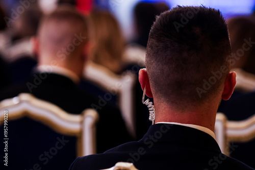 Protection and Guard Service (SPP, Romanian version of the US Secret Service) officer in public during the speech of a dignitary