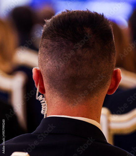 Protection and Guard Service (SPP, Romanian version of the US Secret Service) officer in public during the speech of a dignitary