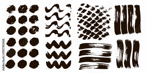 Collection of abstract black brushstrokes and ink splatters arranged in rows