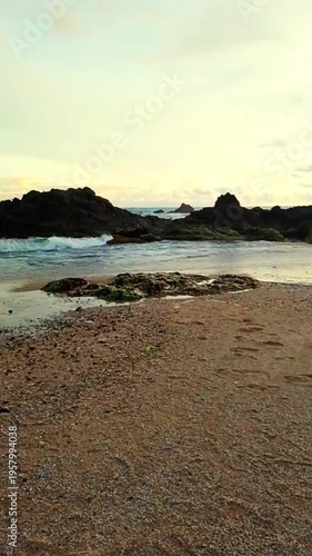 Sunset at the rocky beach