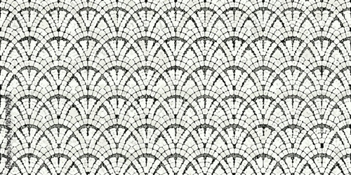 Intricate black and white mosaic pattern resembling stylized fans or petals