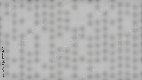 Photography An abstract, blurred background image featuring indistinct light grey geometric