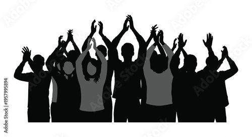 A group of people raising hands in a celebratory moment silhouette