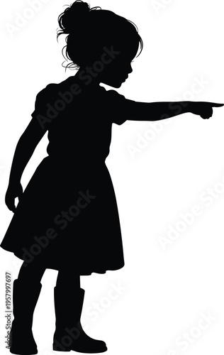 Silhouette of a young girl pointing ahead while wearing a dress and boots representing childhood curiosity, discovery, direction, and exploration. (20 words)
