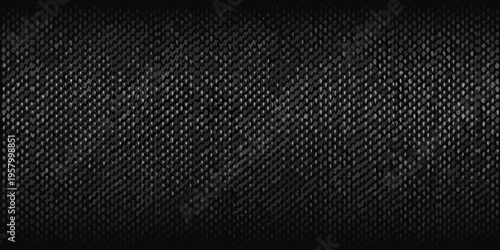 Dark textured background resembling woven carbon fiber material