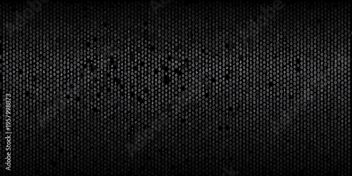 Dark textured background resembling reptile skin or a fishnet pattern