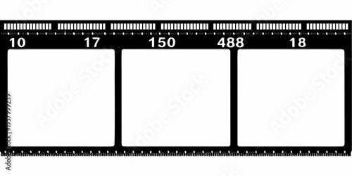 A strip of photographic film with numbered frame markers and blank exposures