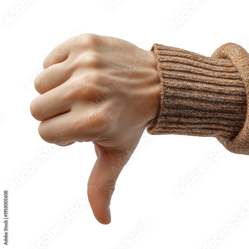 Close-up of male hand doing thumbs down sign isolated on white background. Concept of disapproval, rejection, or negative feedback