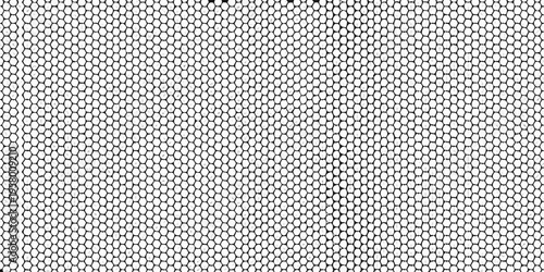 Close up of a black and white honeycomb pattern with hexagonal cells