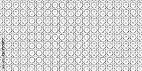 Close up of a metallic chainmail texture with repeating circular links