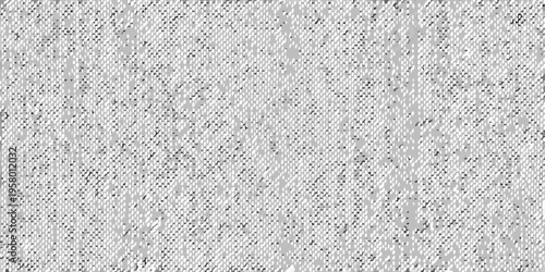 Close up of a grainy textured gray surface resembling woven fabric