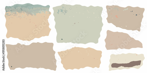 Assorted torn paper scraps with varying textures and neutral tones