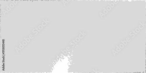 Abstract gray background with a small white splatter in corner