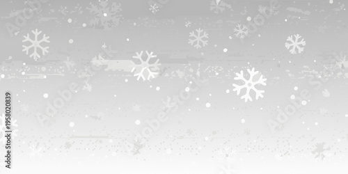 Winter scene depicting reindeer and snowflakes in a grayscale palette