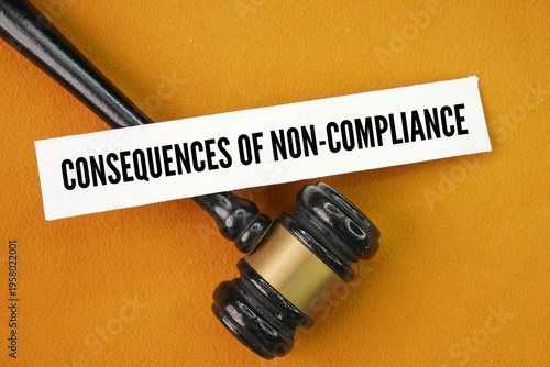 Schilderij op canvas Judge's gavel and paper with the words Consequences of Non-Compliance