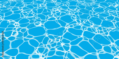 The sunlight reflects off the rippling surface of a swimming pool.