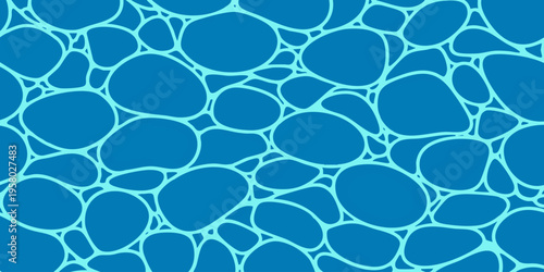 A close-up view of a pool's surface with rippling turquoise water and abstract stone-like patterns.