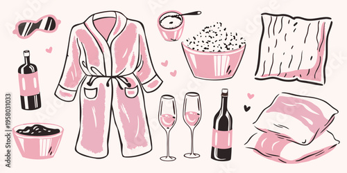 Relaxing self care items including a robe wine and popcorn are displayed