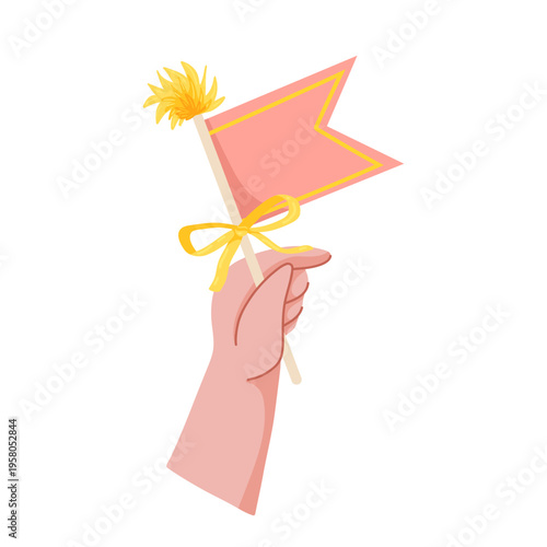 Hand holding birthday party flag with ribbon and pom-pom decoration. Festive celebration element isolated on white. Flat vector cartoon hand drawn illustration for web, sticker, print