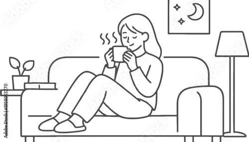 Woman relaxing on a couch with a cup of coffee in a cozy living room