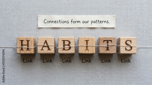 Wooden Blocks Spelling Habit with Connecting Threads and Inspirational Quote About Patterns