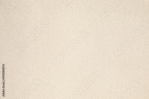 Beige kraft paper texture with fiber speck details