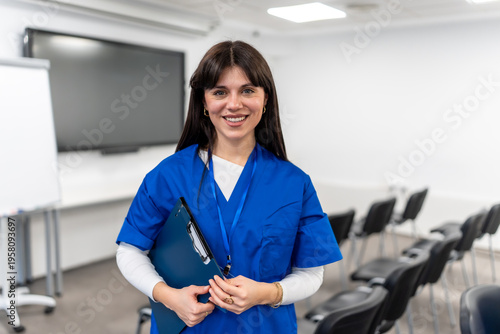 Canvas Print Healthcare professional holding clipboard in modern learning environment