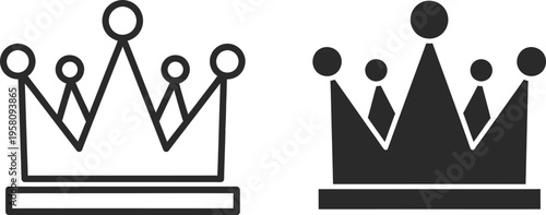 Two crowns are placed side by side on a flat surface for comparison.