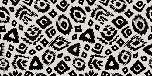 Abstract black and white pattern resembling animal prints and tribal art