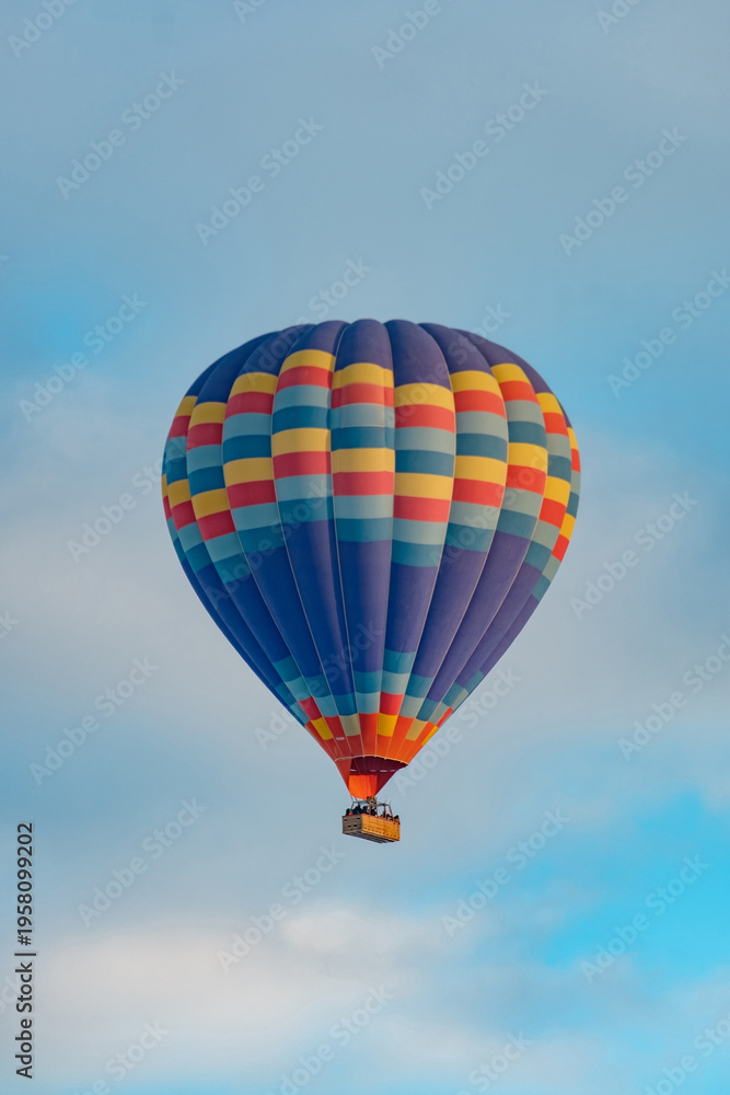 Fototapeta premium Colorful hot air balloons flying above Nevsehir Cappadocia fairy chimneys