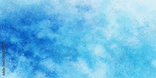 Abstract blue watercolor texture merges with a bright winter sky and soft white clouds to create a cold frost pattern on a light nature surface