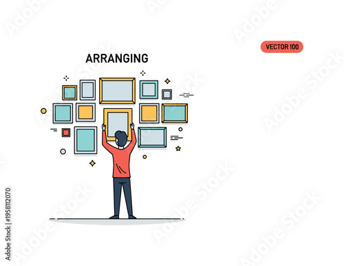 Arranging wall frames collection of picture frames forming a neat gallery layout while a person adjusts the central frame. Visual metaphor of organization,