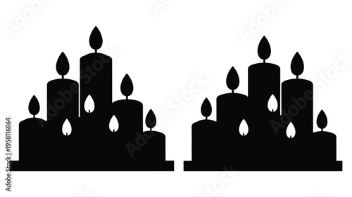 Two groups of black candles with cutouts a striking silhouette