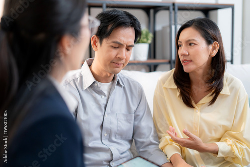 Photos Asian couple therapy counseling and relationship support, mental health, consultation about anxiety, stress and depression, psychologist advising family conflict management, conversation for empathy
