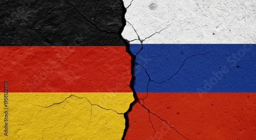 Divided Nations: A stark visual representation of the fractured relationship between two nations, depicted by cracked concrete displaying the flags of Germany and Russia.