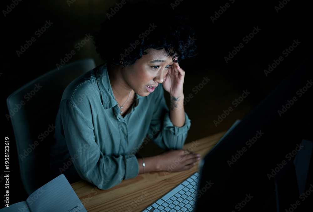 Obraz premium Stress, night and business woman online with mistake on audit, finance review and deadline fail. Dark, office and person with burnout for financial crisis, frustrated and error for budget report