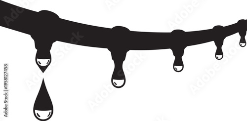 Black liquid dripping down from a curved surface slowly