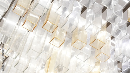 Modern glass chandelier with geometric hanging tubes interior design